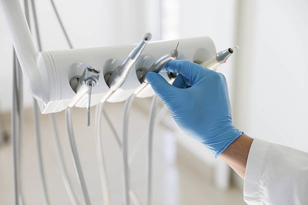 Professional Tooth Extraction technician working in Fort Totten, ND